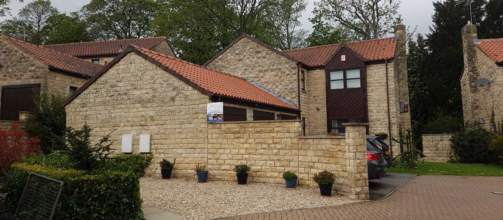 new tiler roofing executive house